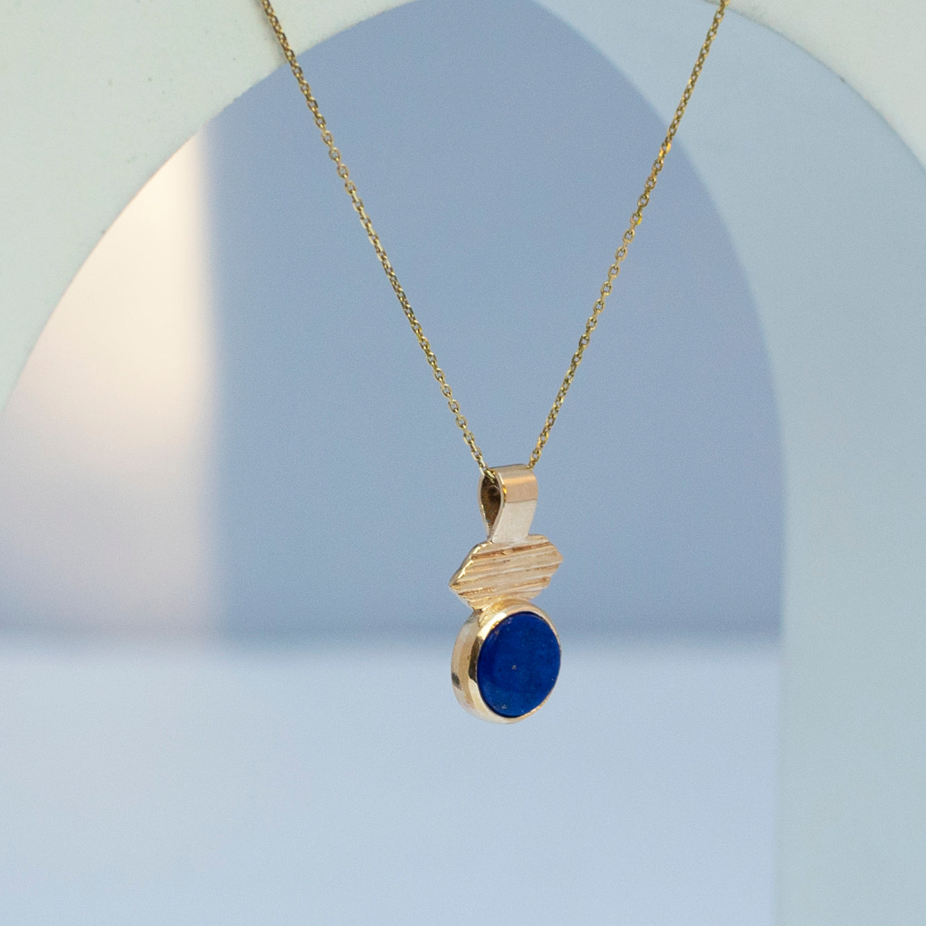 Gold Textured Necklace with Lapis Lazuli