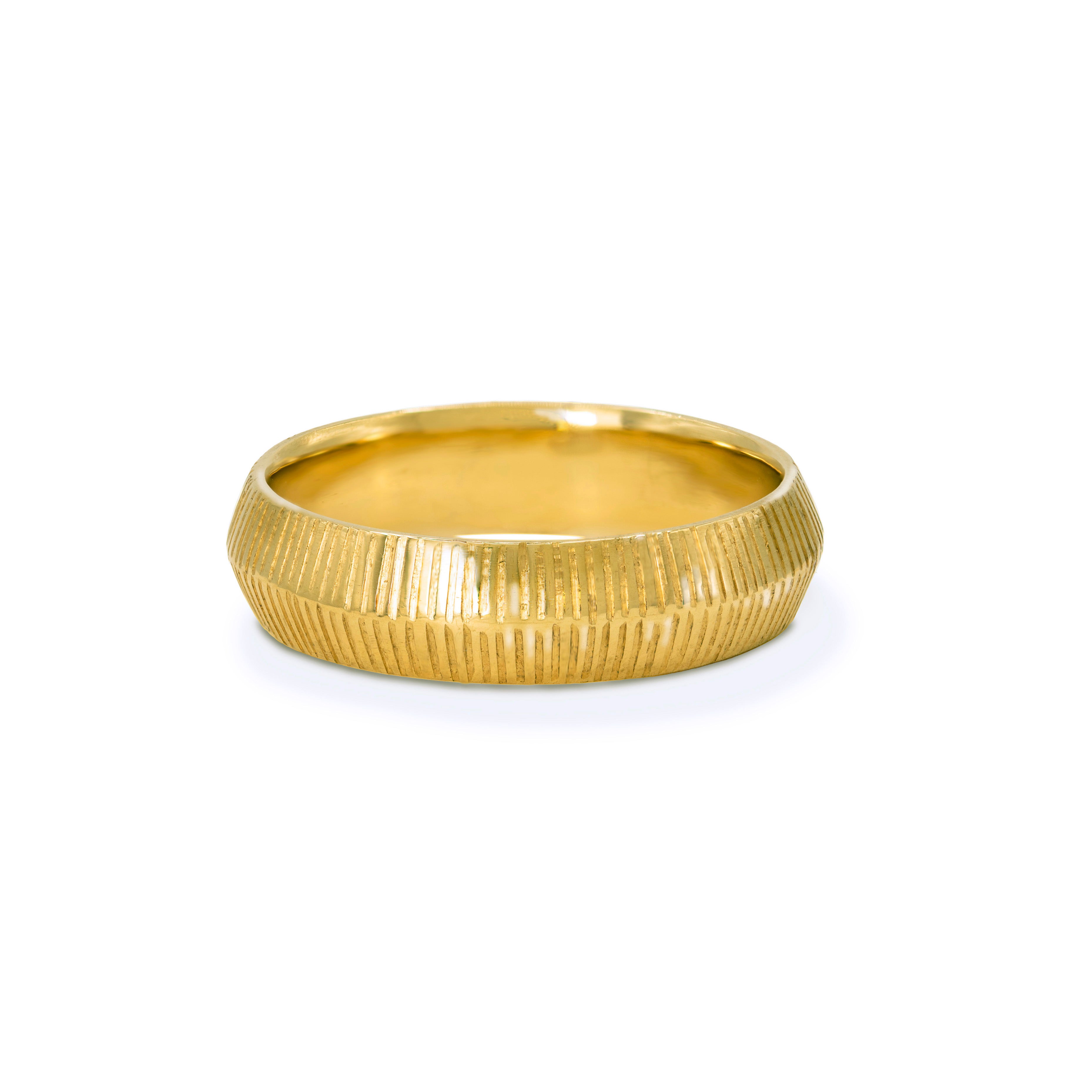 18ct gold wedding ring with a peaked profile and fine linear engraved texture, shown on a white background.