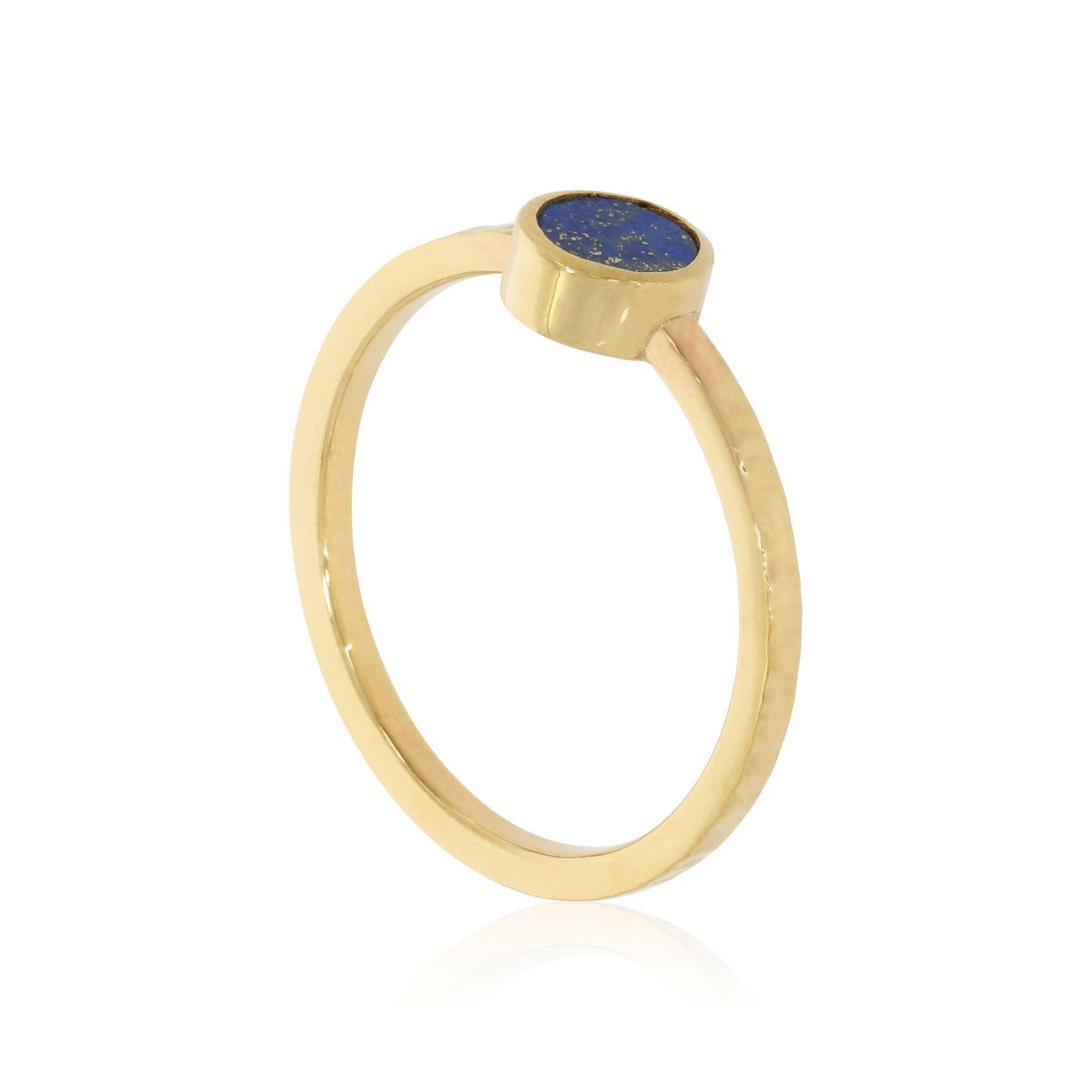 Scintilla Ring with Lapis Lazuli, a round lapis lazuli cabochon set in a fine gold band, shown on a white background.