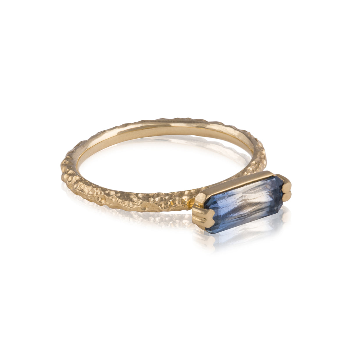 Indigo Dawn Gold Ring with Bi-Colour Sapphire worn on a hand