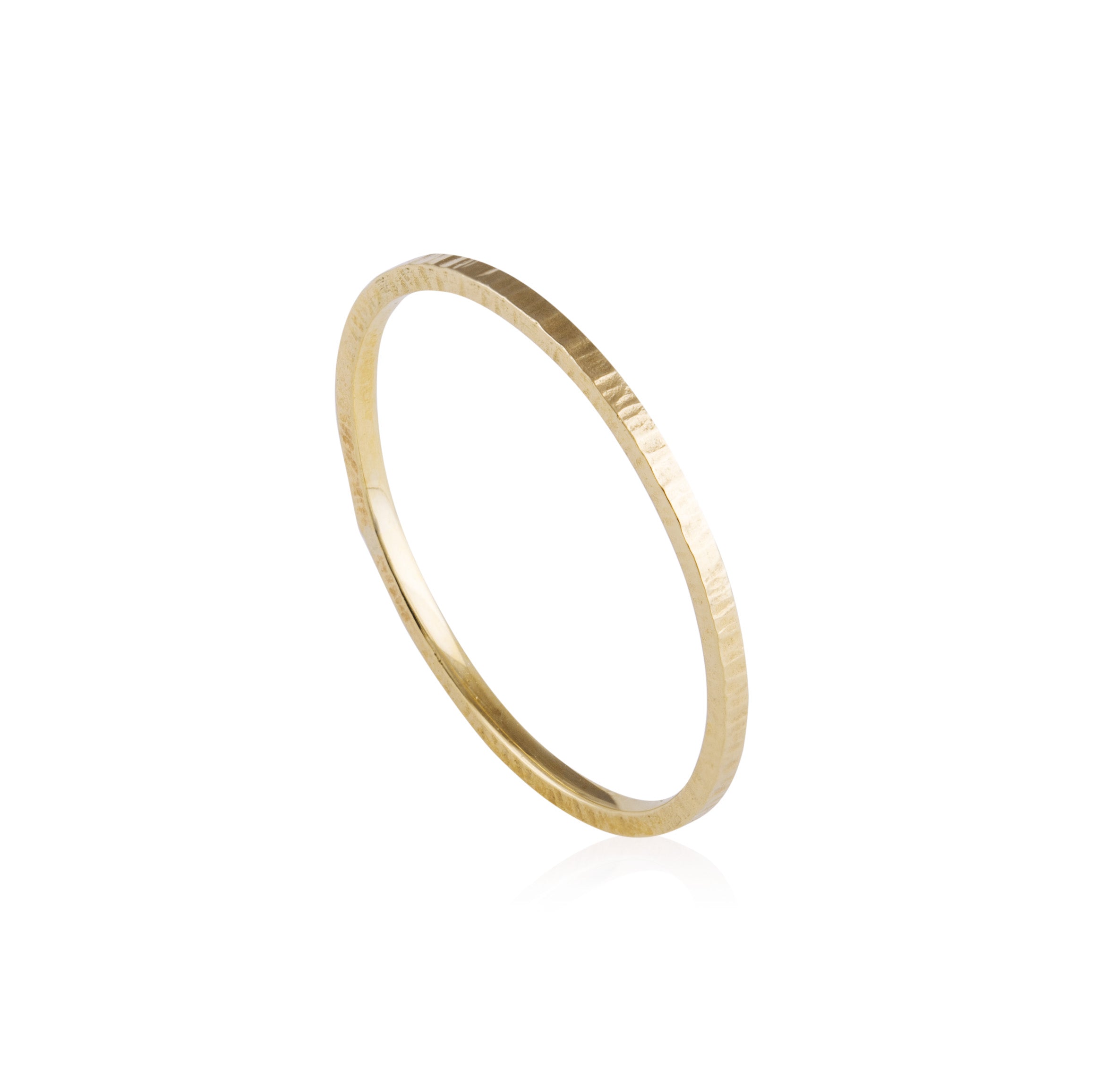 Close-up top view of the Striated Band Ring - Fine showing the hammered texture detail.